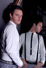 Male and reflection in mirror