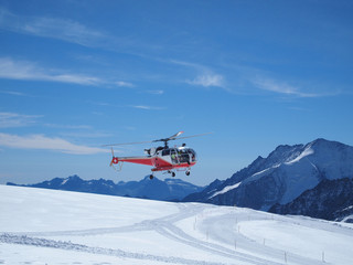 Fototapeta premium whirlybird copter at Jungfraujoch Top of Europe Switzerland