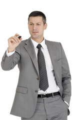 Businessman writing with marking pen
