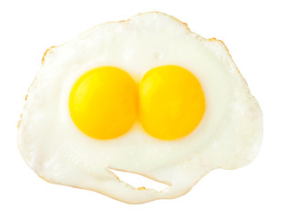 Fried eggs that look like funny face isolated on white backgroun
