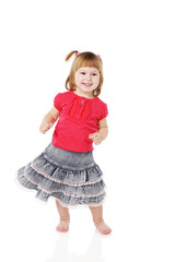 cheerful little girl on a light background