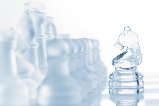 transparent glass chess isolated on white
