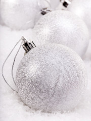 Christmas ball in snow.