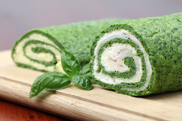 Spinach roll with eggs and cheese and with ham and garlic cheese