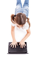 Little student girl with a laptop