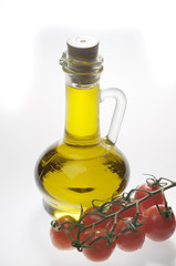 Food close-up with olive oil and vegetables
