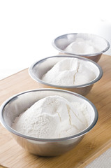Fototapeta na wymiar White flour in bowl