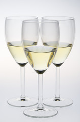 wineglasses with white wine