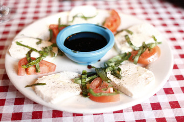 Mozzarella Caprese on a dining table at a restaurant