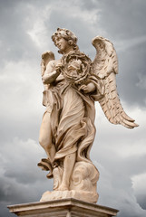Fototapeta na wymiar Angel with the thorn crown statue on Ponte Sant'Angelo