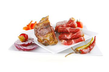 served beef rolls with chunk on white