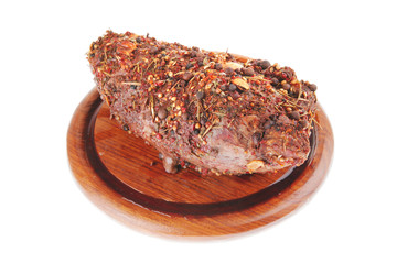 roast beef meat in spice on wood