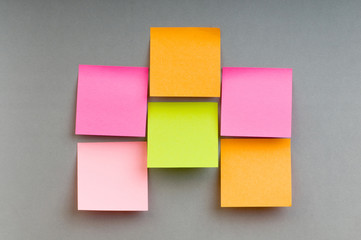 Reminder notes on the bright colorful paper