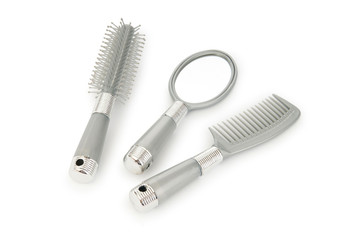 Grey hairbrush isolated on the white background