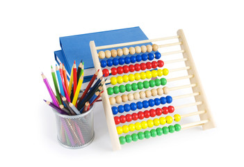 Education concept with pencils, books and abacus