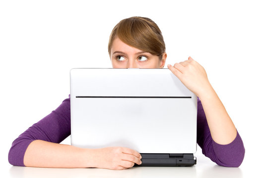 Girl Peeking Over Laptop Computer