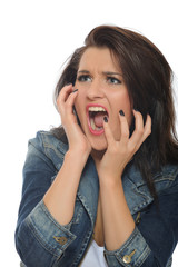 Expressions.Young attractive woman with open mouth feeling fear