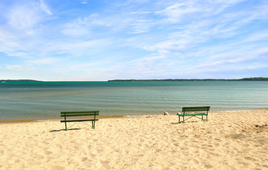 lake Michigan empty beach with benches