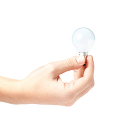 Hand holding a light bulb isolated on white background