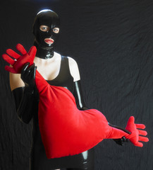 woman in latex with heart