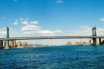 Brooklyn bridge in New York on bright summer day