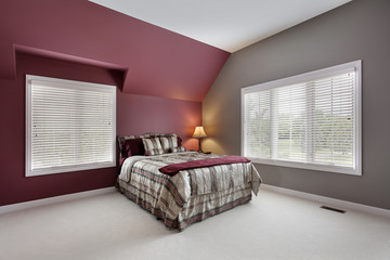 Large bedroom with multicolored walls