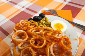 fried calamaries rings. Cooking  squid see in series © JackF