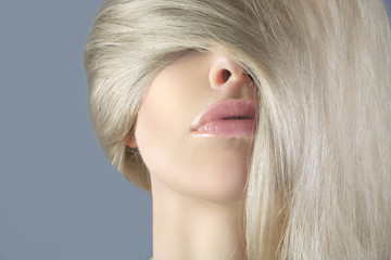 Long hair blonde in the face of a woman.