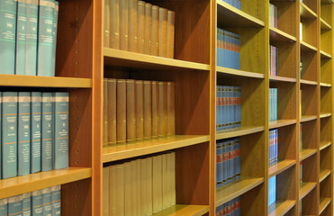 wooden library with a great collection of legal books