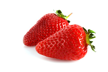Two strawberries isolated on white