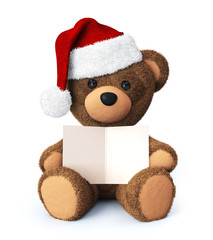 Teddy bear with santa hat and greeting card