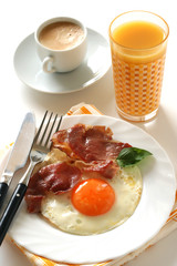 fried egg with ham, coffee and juise