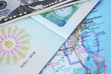 passport and banknotes with usa map background