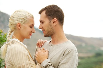 Young couple in love outdoors