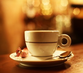 Coffee cup on abstract background