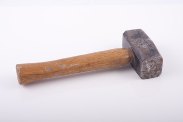 Old used hammer isolated on white background