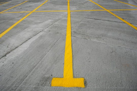 Yellow stripe in a parking lot