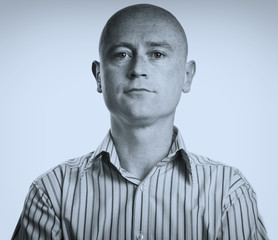 Obraz premium business man portrait in his 30's on white