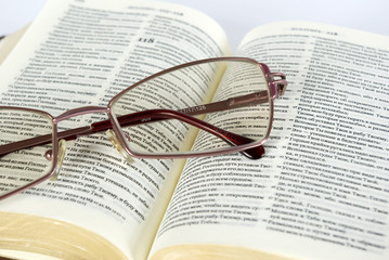 book and spectacles