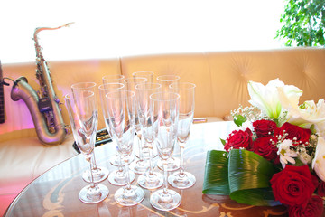 Flowers, glasses and saxophone