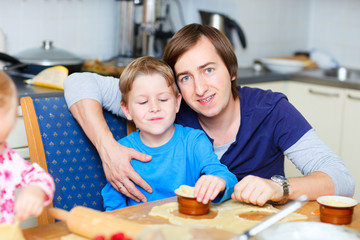 Father and son baking