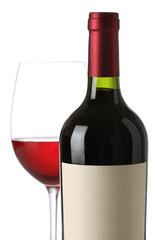 Red wine bottle with and empty label and glass
