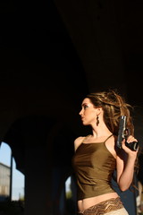 Sexy woman with gun