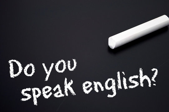 Tafel mit Do you speak english - Powered by Adobe