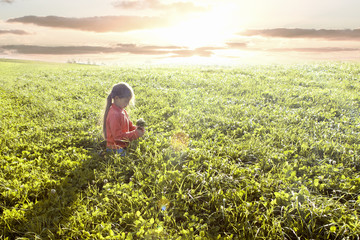 little girl in field