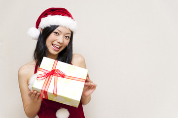 a portrait of santa woman taking present