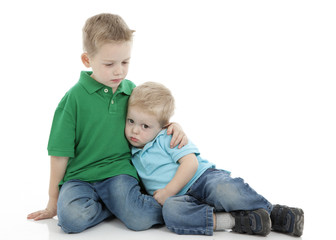 Sad Brothers Comforting Each Other