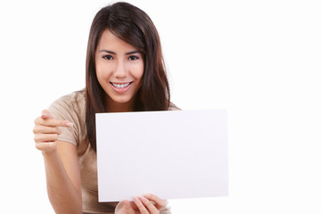 Naklejka premium Young female pointing to blank card