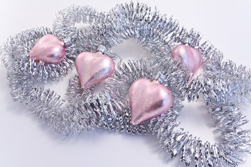 pink christmas decoration with silver garland