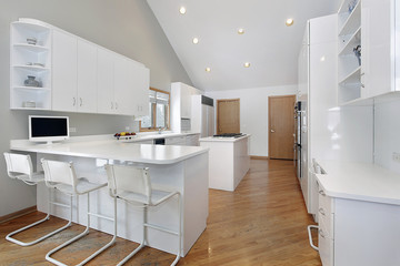 Kitchen with white cabinetry
